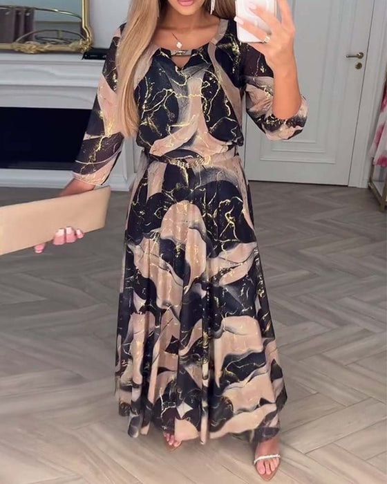 Elegáns sifon ruha nyomtatott mintával és háromnegyedes ujjakkal