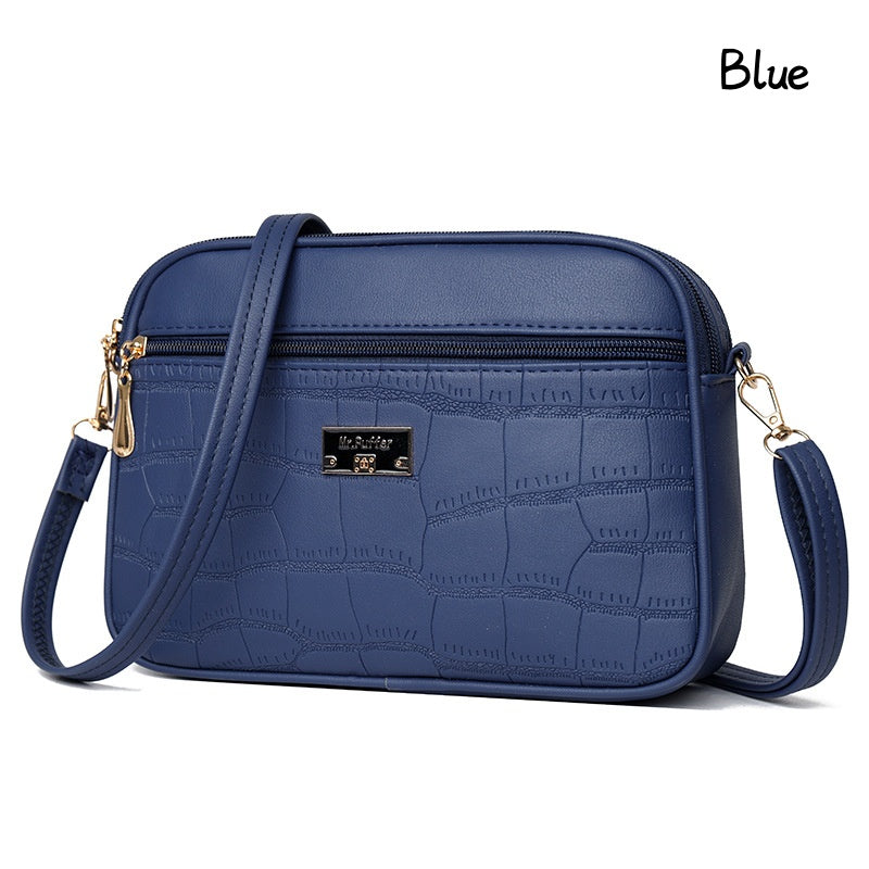 đDivatos, egyszerƱ nĆi crossbody tĂĄska