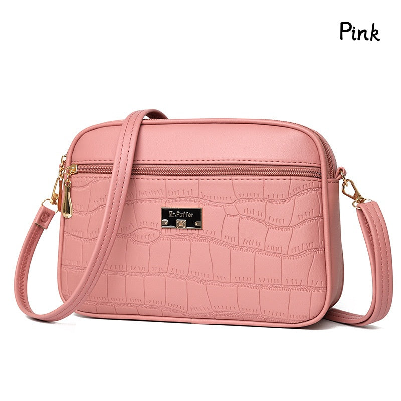 đDivatos, egyszerƱ nĆi crossbody tĂĄska