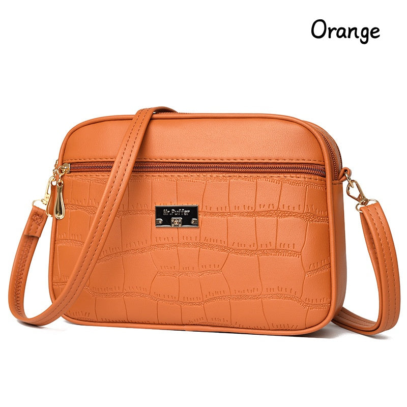 đDivatos, egyszerƱ nĆi crossbody tĂĄska