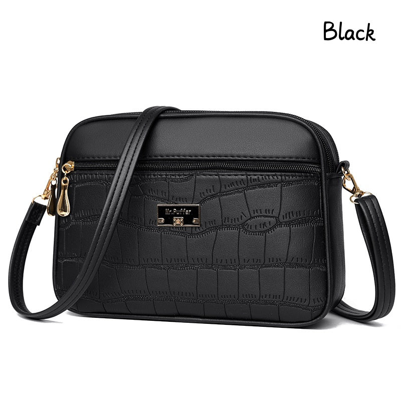 đDivatos, egyszerƱ nĆi crossbody tĂĄska