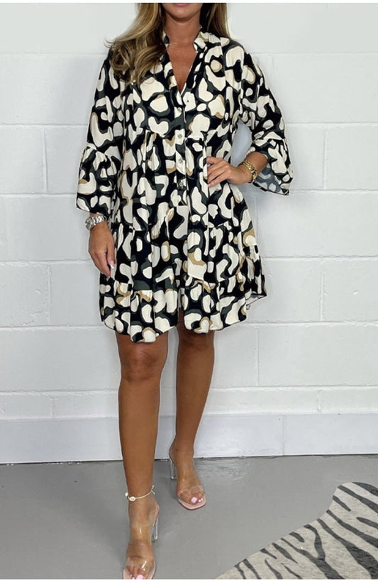 Tavaszi és nyári új, nagy méretű szabálytalan nyomott ruhák