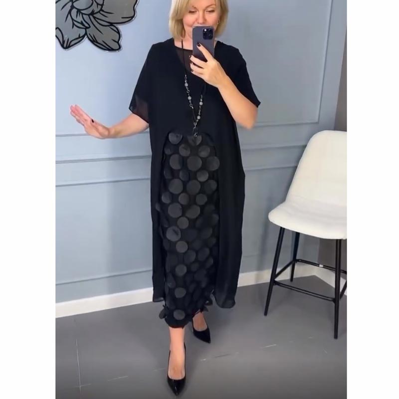 Elegáns, V-nyakú, fekete női ruha, szabálytalan zakóval, kétrészes szett