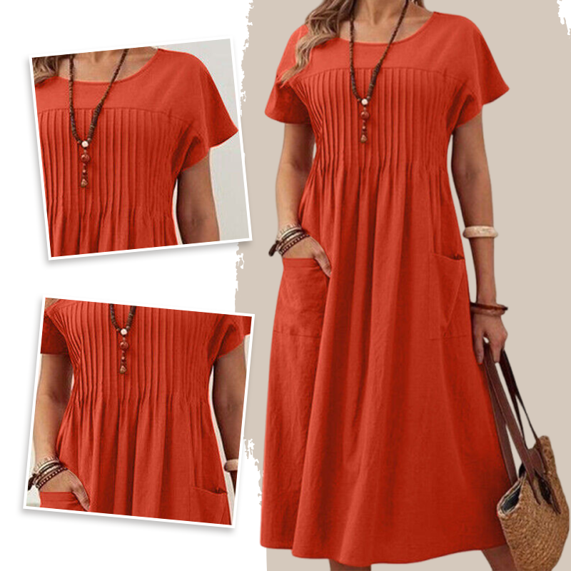 Női rakott ruha rövid ujjal és zsebekkel