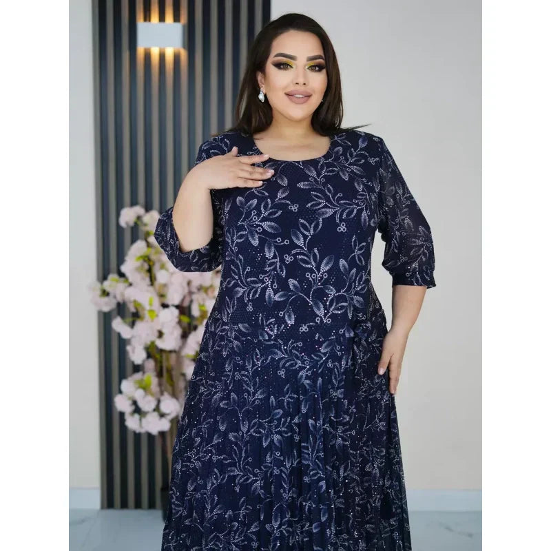 Kerek nyakú, 3/4-es ujjú, mintás maxi ruha