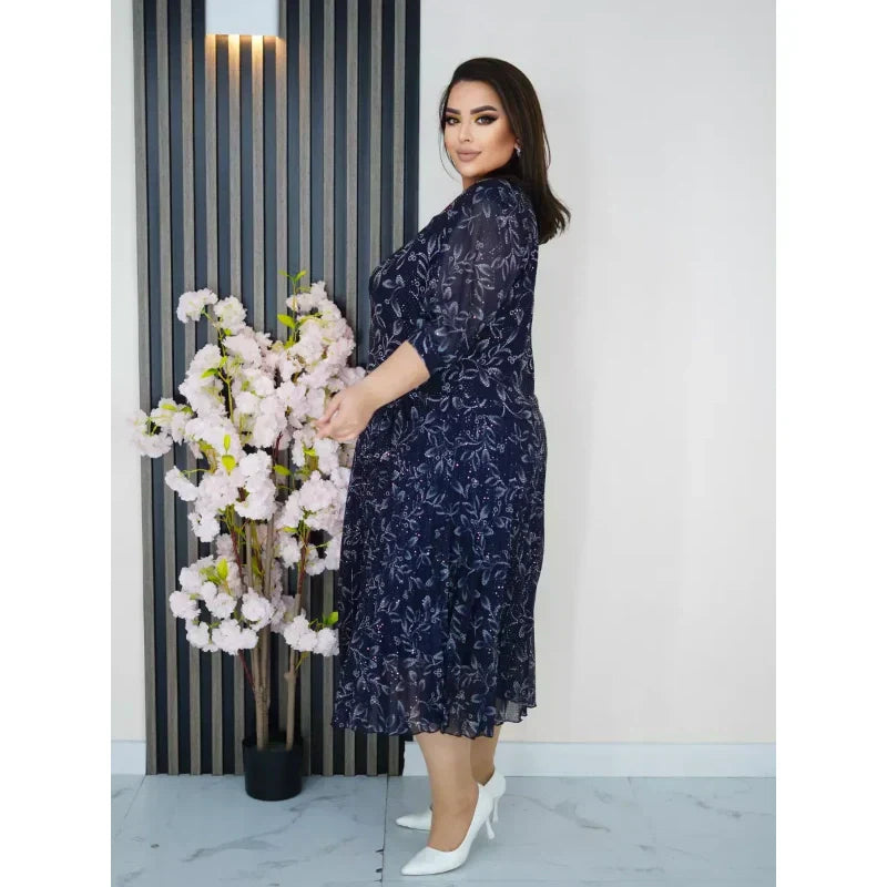 Kerek nyakú, 3/4-es ujjú, mintás maxi ruha