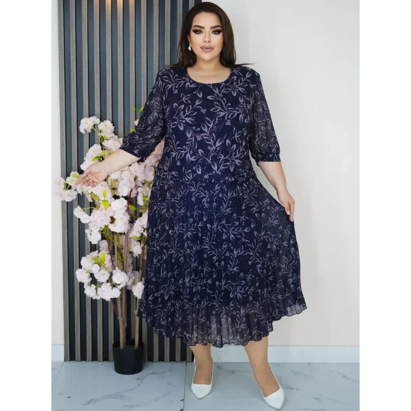 Kerek nyakú, 3/4-es ujjú, mintás maxi ruha