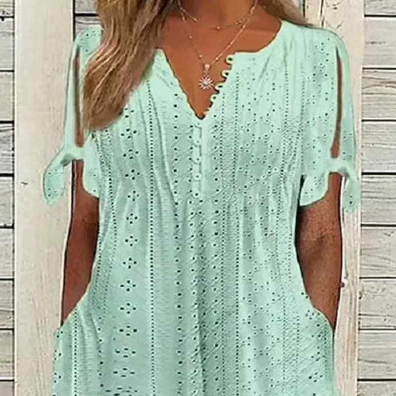 Elegáns női ruha V-nyakkal